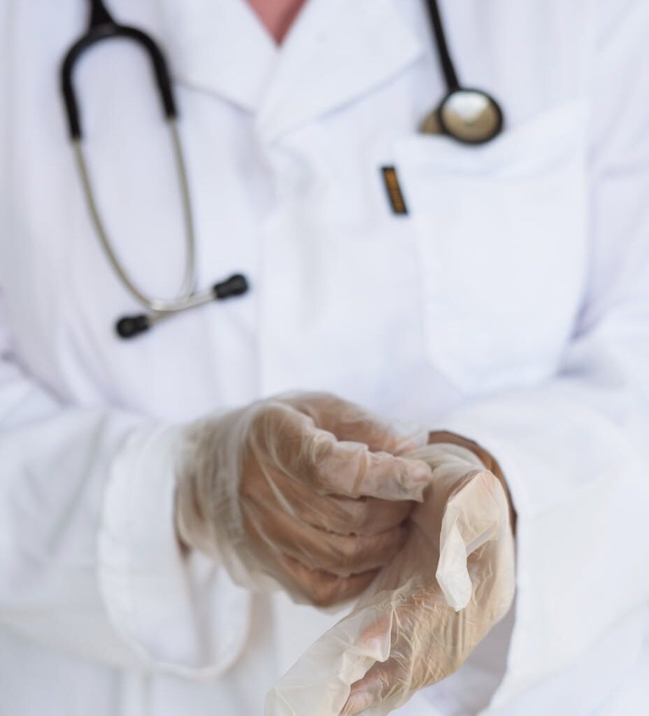 crop doctor with stethoscope preparing for surgery in hospital