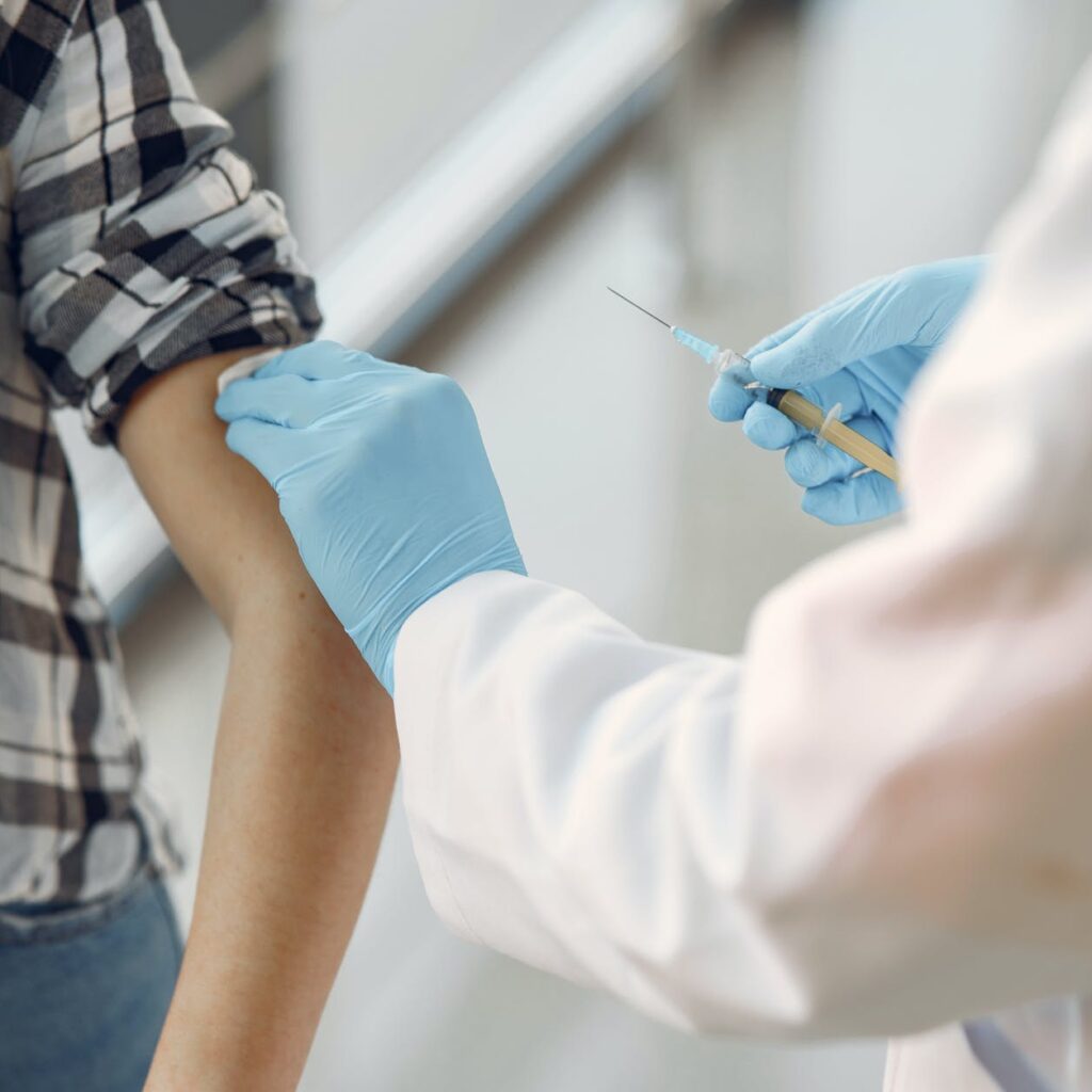 person getting vaccinated