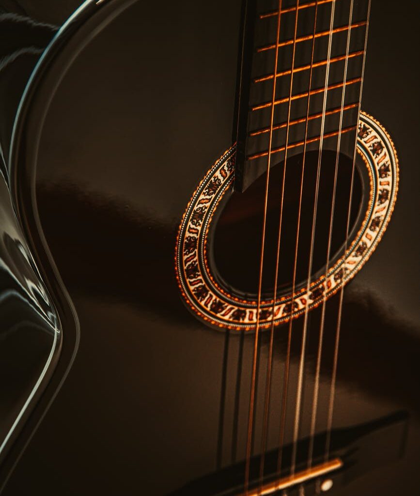 close up shot of a black guitar