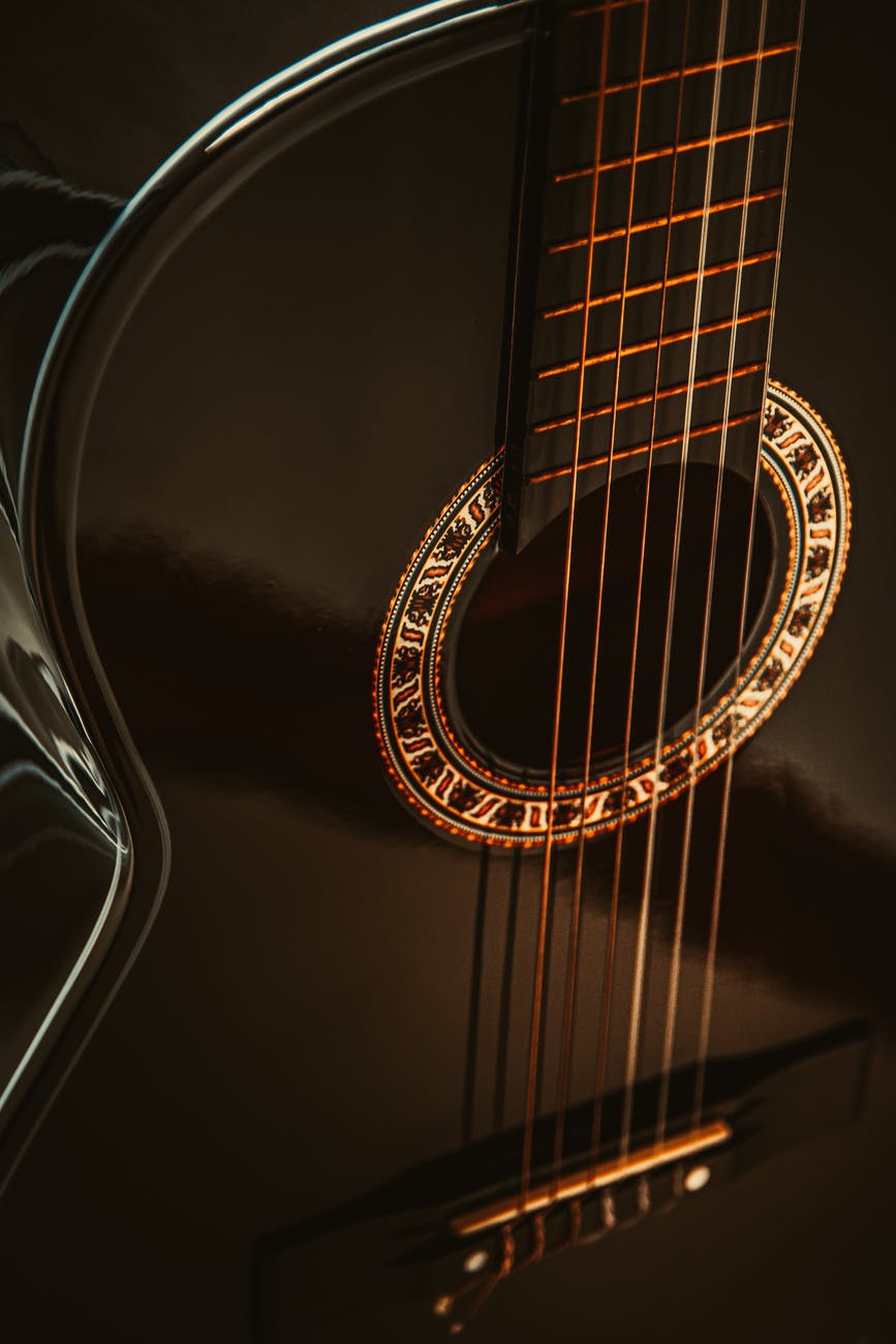 close up shot of a black guitar