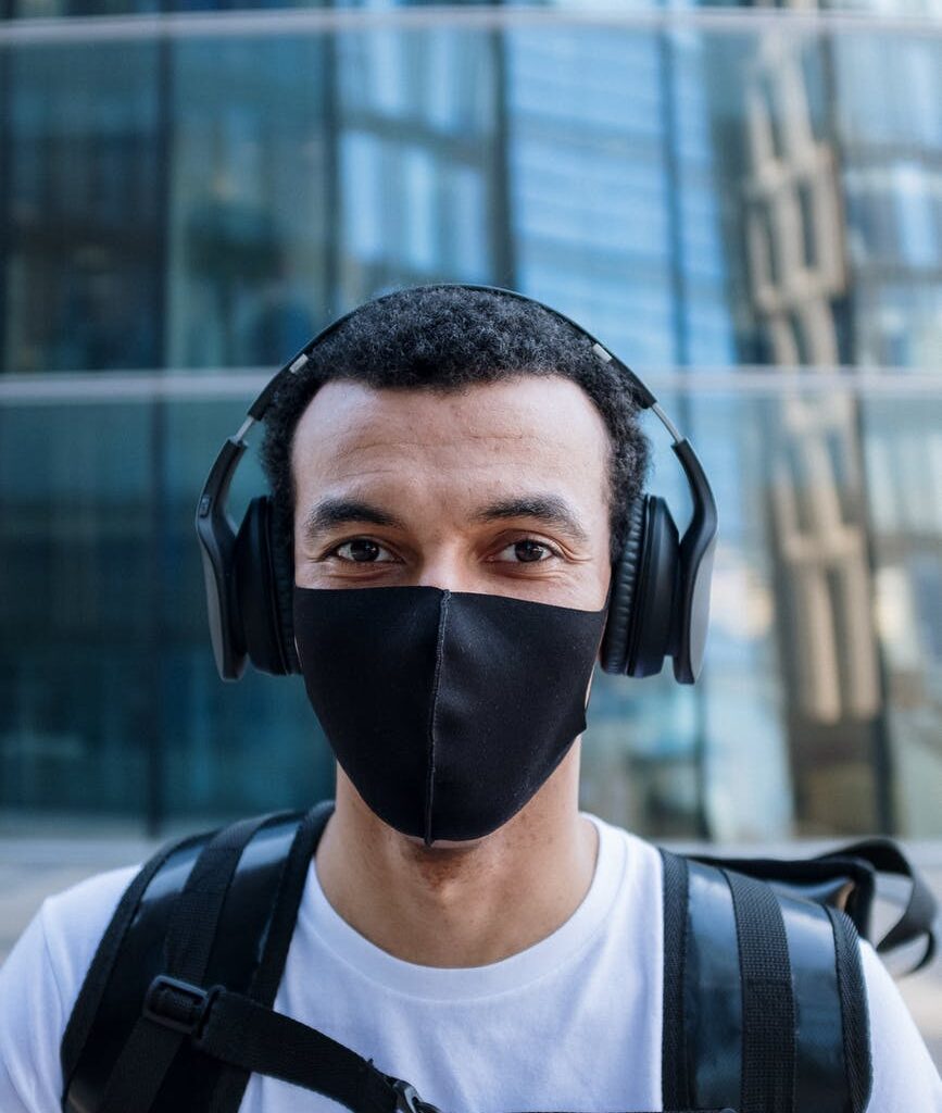 man in black face mask