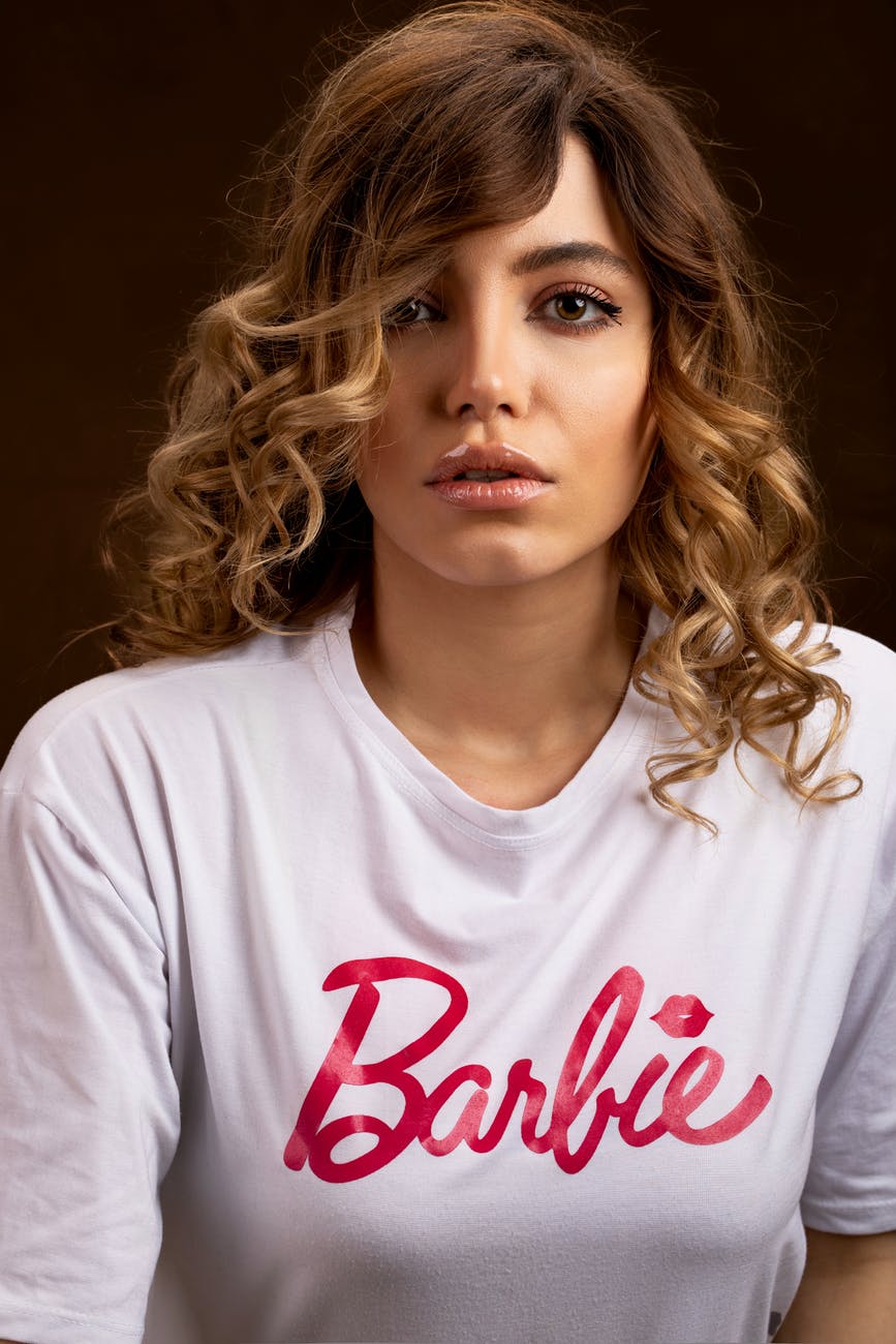 beautiful woman wearing a white shirt posing