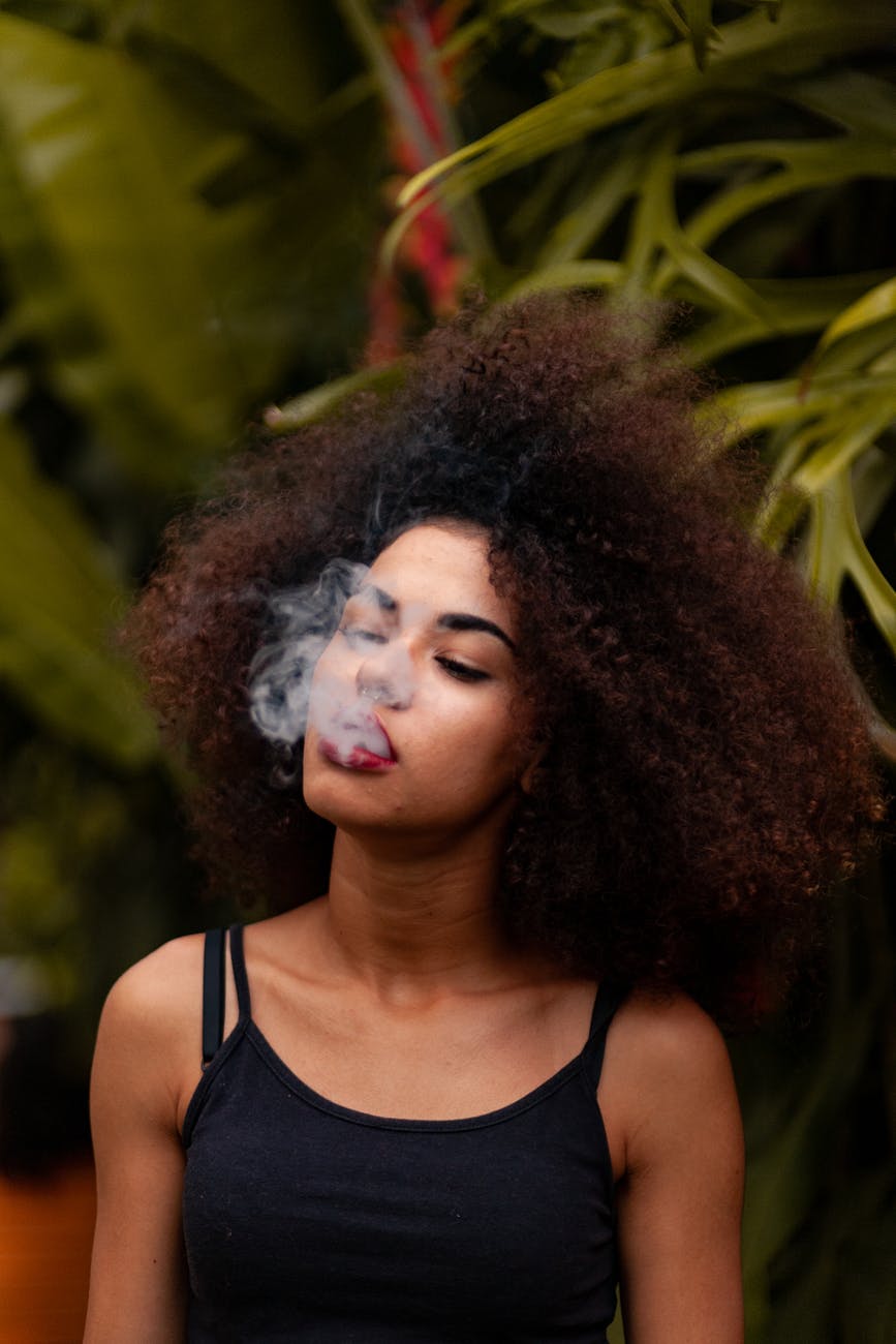 smoke coming out of person s mouth
