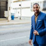 man wearing blue blazer